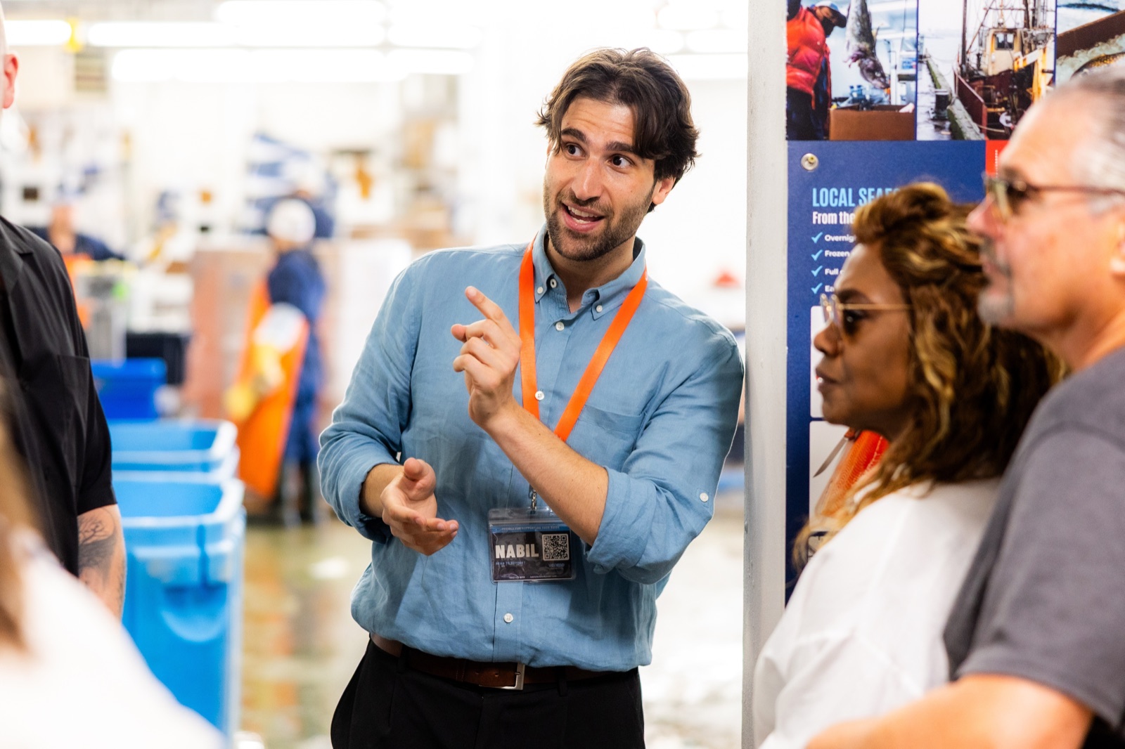 Nabil describing the local seafood supply chain to guests at Boston's Fish Pier