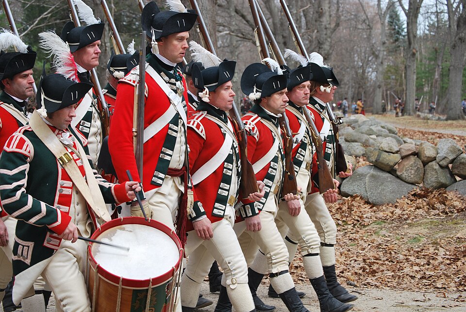 Revolutionary War reenactors marching at Lexington and Concord